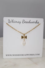 Load image into Gallery viewer, Dainty Freshwater Pearl & Gold Bow Pendant Necklace