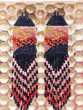 Load image into Gallery viewer, hand woven seed bead earrings with long swaying fringe created from a photo of an everglades sunset over the saw grass.
